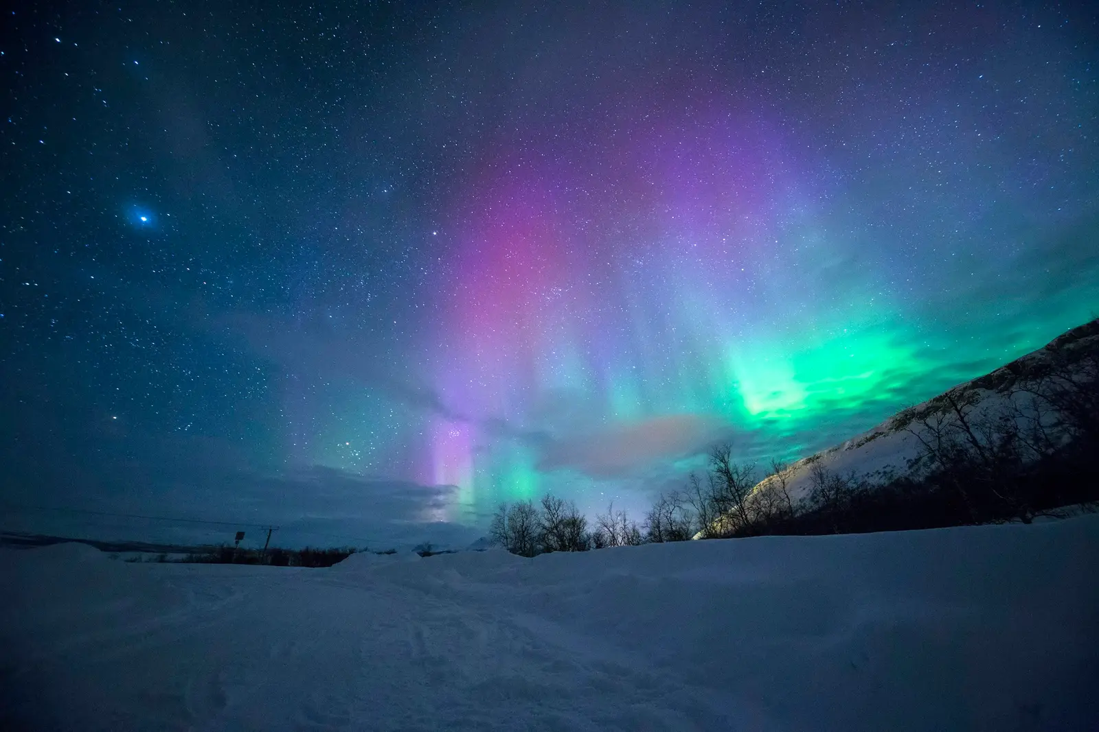 Aurora borealis reflected over the Icelandic landscape