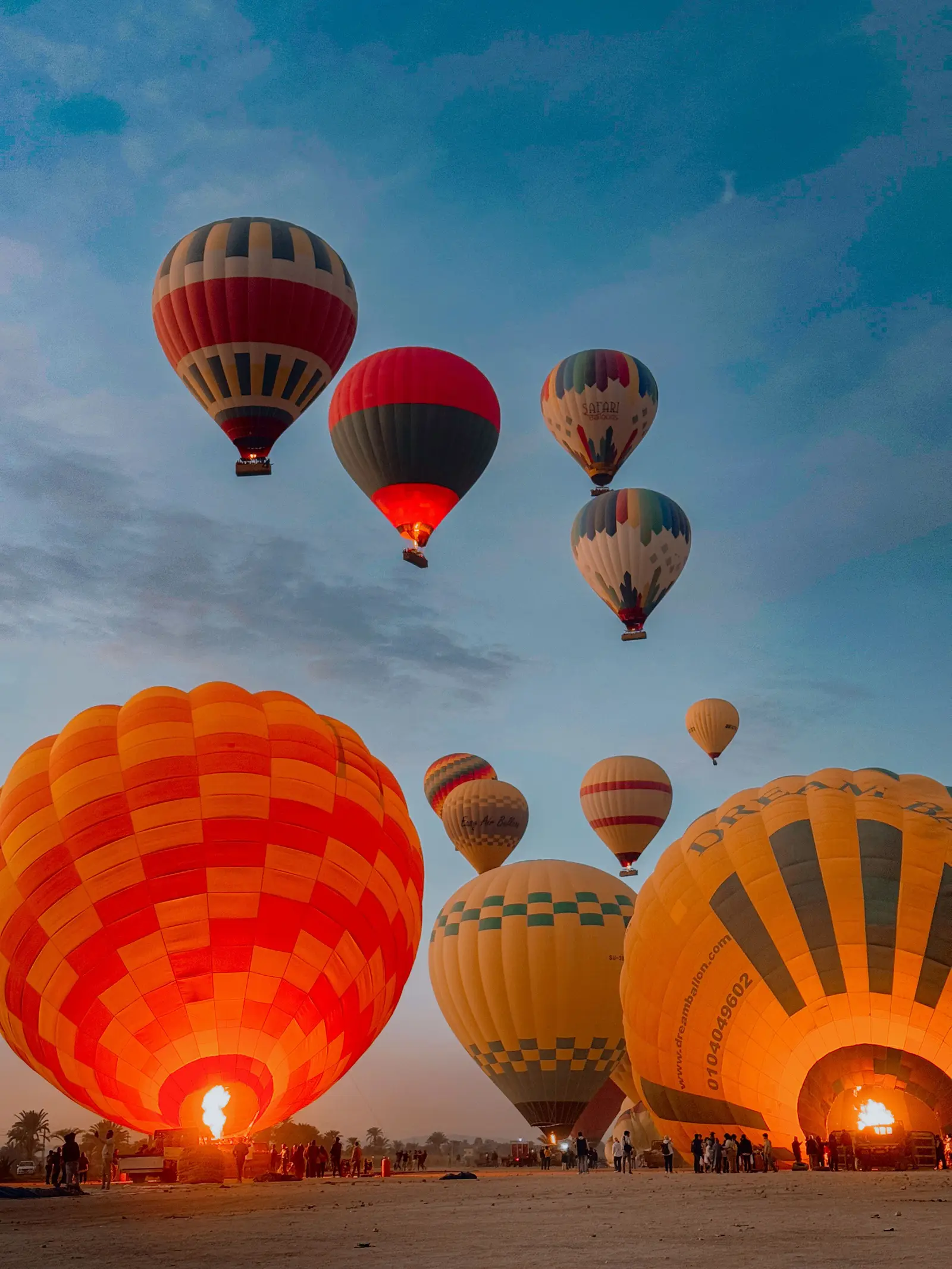 Hot-air balloon at sunrise over the Luxor valley